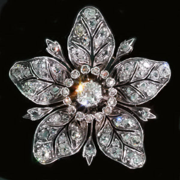 Gold backed silver Victorian flower brooch and pendant loaded with diamonds